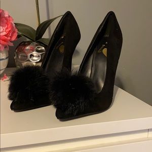 Puff ball black heels from Revolve